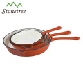 Juego de utensilios de cocina de hierro fundido color naranja, 5 piezas